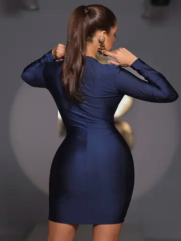 VESTIDO FEMININO EXUBERANTE PIT BULL COM MANGA LONGA E DECOTE PROFUNDO Ref: 85282